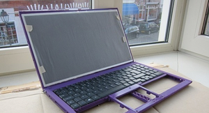 Figure 1: An early version of the laptop showing 3D-printed parts.