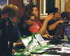 Figure 2: Many projects set up in the cramped hallways of the Free University of Brussels, among them OLPC and Fedora.